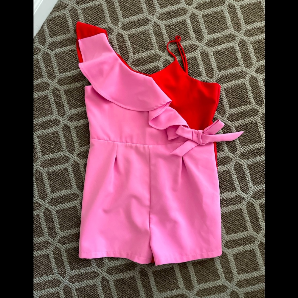 Bardot junior one sleeved romper.